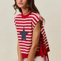 Red and ivory striped sleeveless vest top with navy star patch and draped side tie