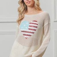 Off-white knit sweater with American flag heart sequin graphic, long sleeves.
