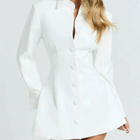 White blazer-style mini dress with notched collar, long sleeves, and button front.