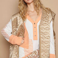 Quilted mocha front-zip vest with V-neck placket and side pockets