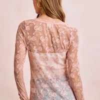 Dusty rose sheer mesh cardigan with bow-pattern print on the back, long sleeves, button front