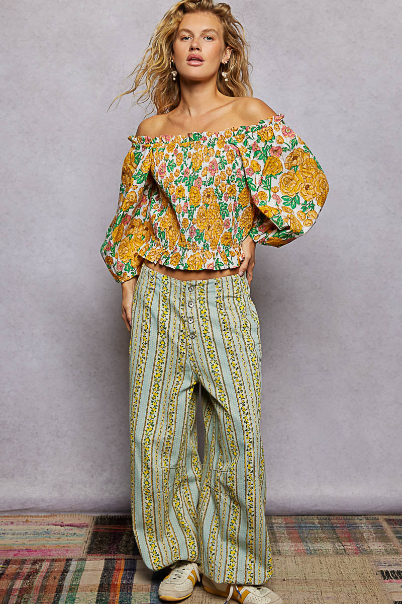 Floral off-shoulder smocked blouse with elastic neckline and long puff sleeves