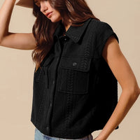 Black knit button-up vest with cable-quilt texture and flap chest pockets