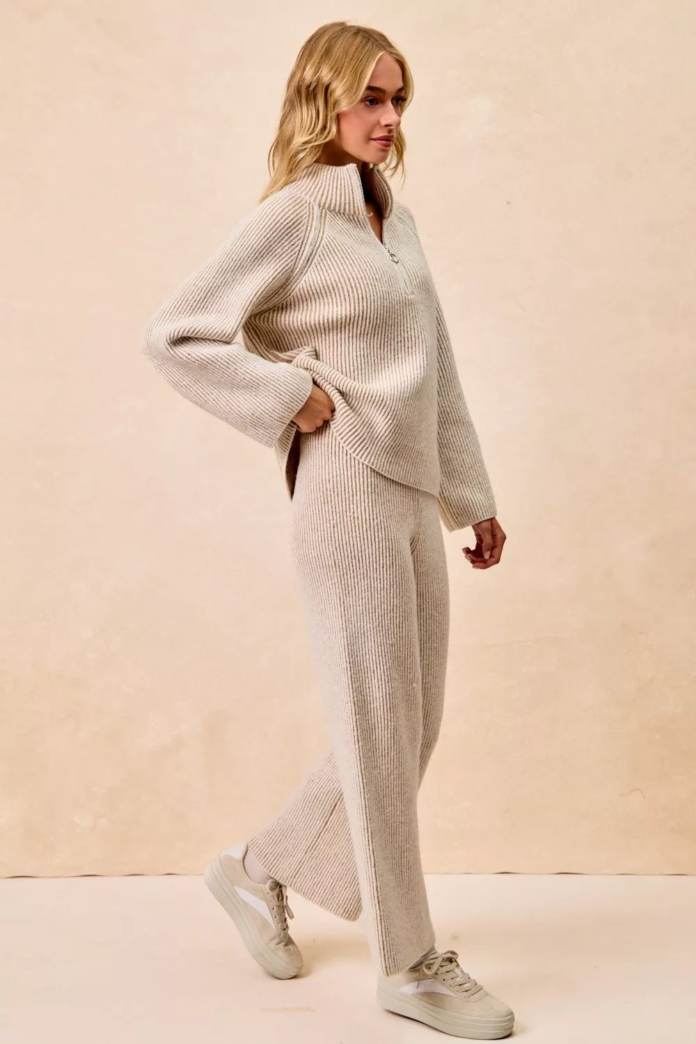 Taupe two-tone ribbed knit quarter-zip collared sweater top, side profile