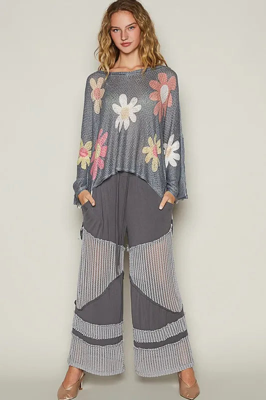 Floral print dropped-shoulder knit top with long sleeves, charcoal base