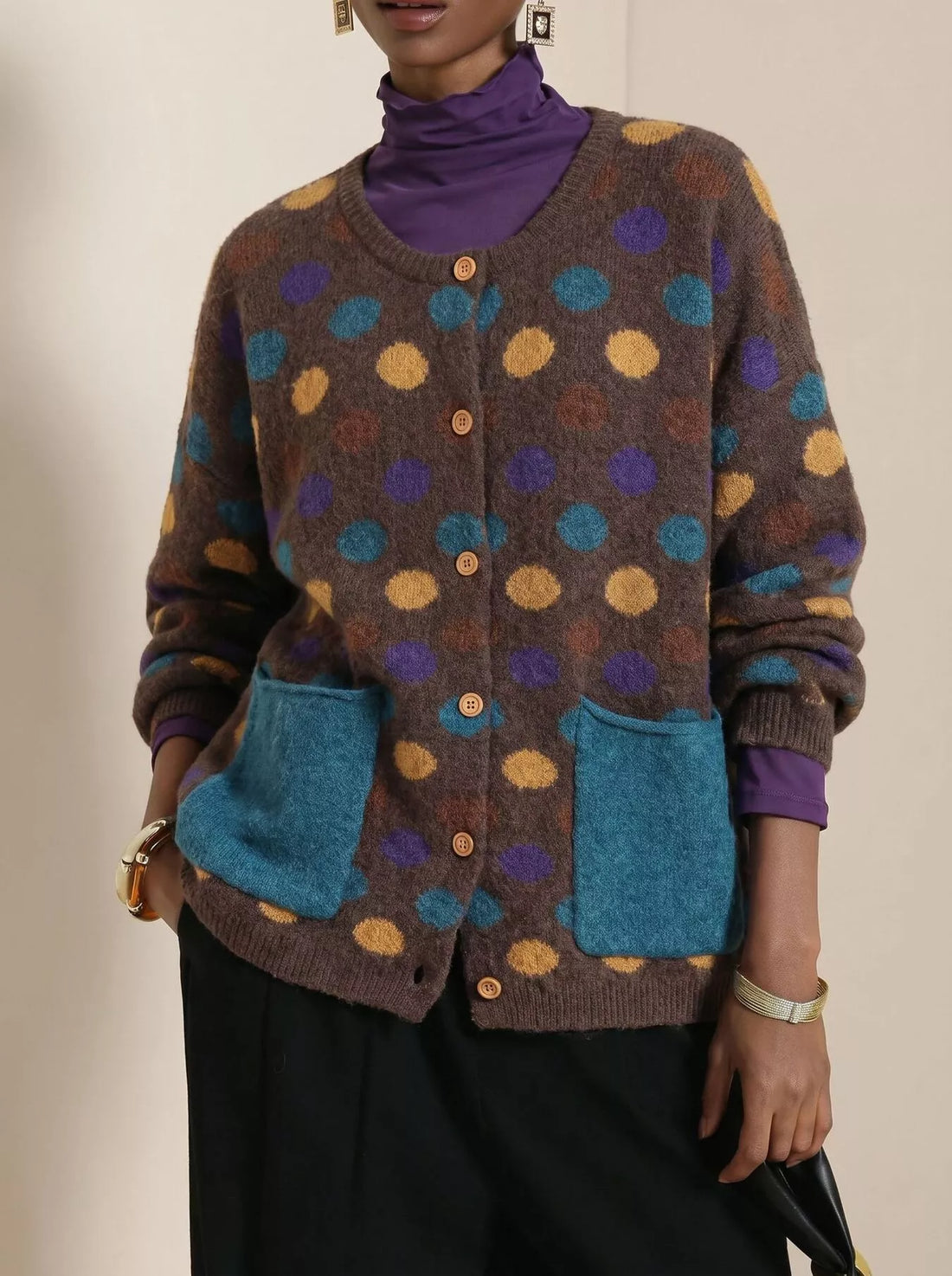 Plus-size dark brown polka-dot button cardigan with two blue patch pockets and ribbed cuffs