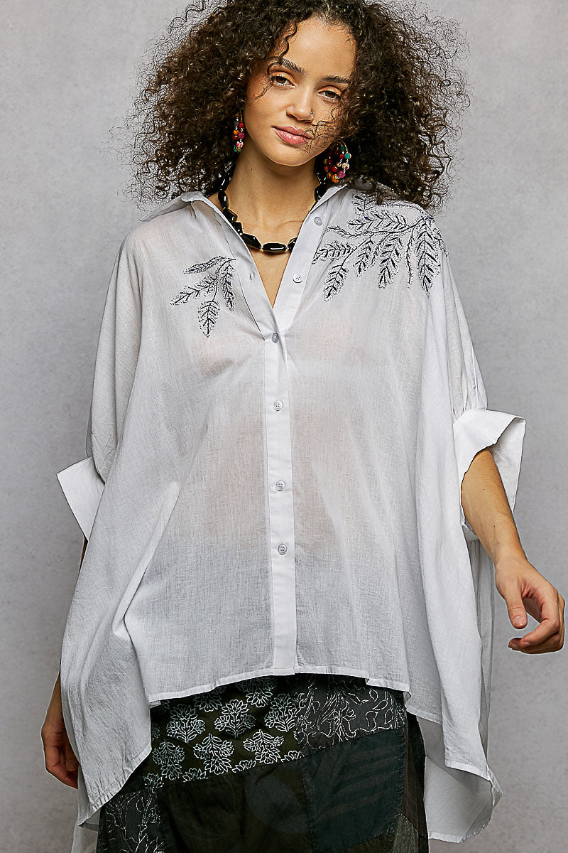 Ivory embroidered floral button-front high-low shirt, front view with V-neck collar
