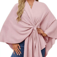 Blush pink women’s cape shawl with front tie knot and flowing poncho sleeves