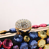 Rhinestone top clasp detail on crystal clutch bag