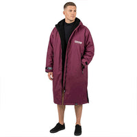 Plum long changing robe with black fleece-lined hood and front pockets, modeled