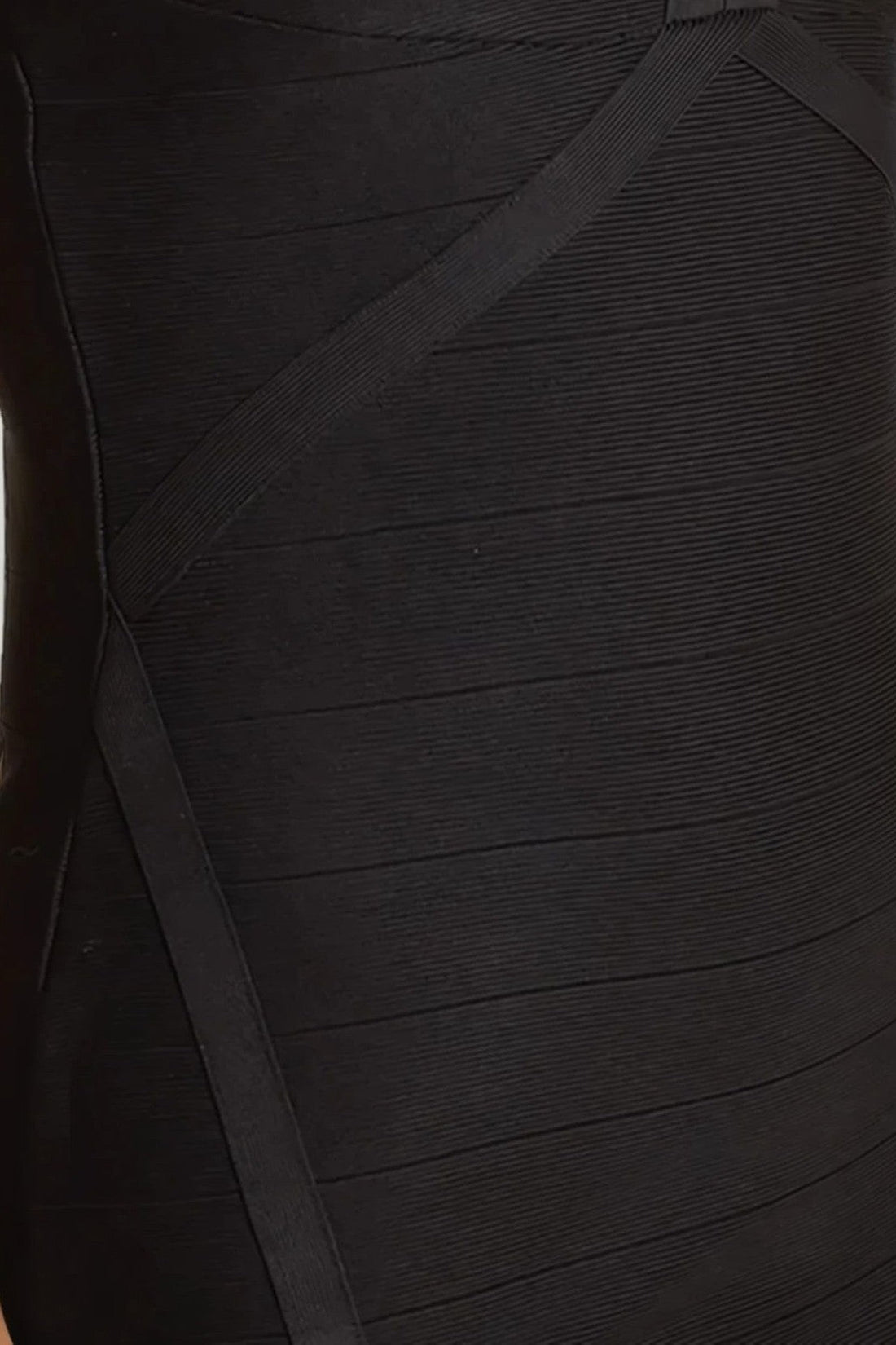 Black bandage dress fabric with stitched horizontal paneling detail