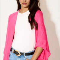 Fuchsia kimono cardigan with open front, batwing sleeves draping at sides