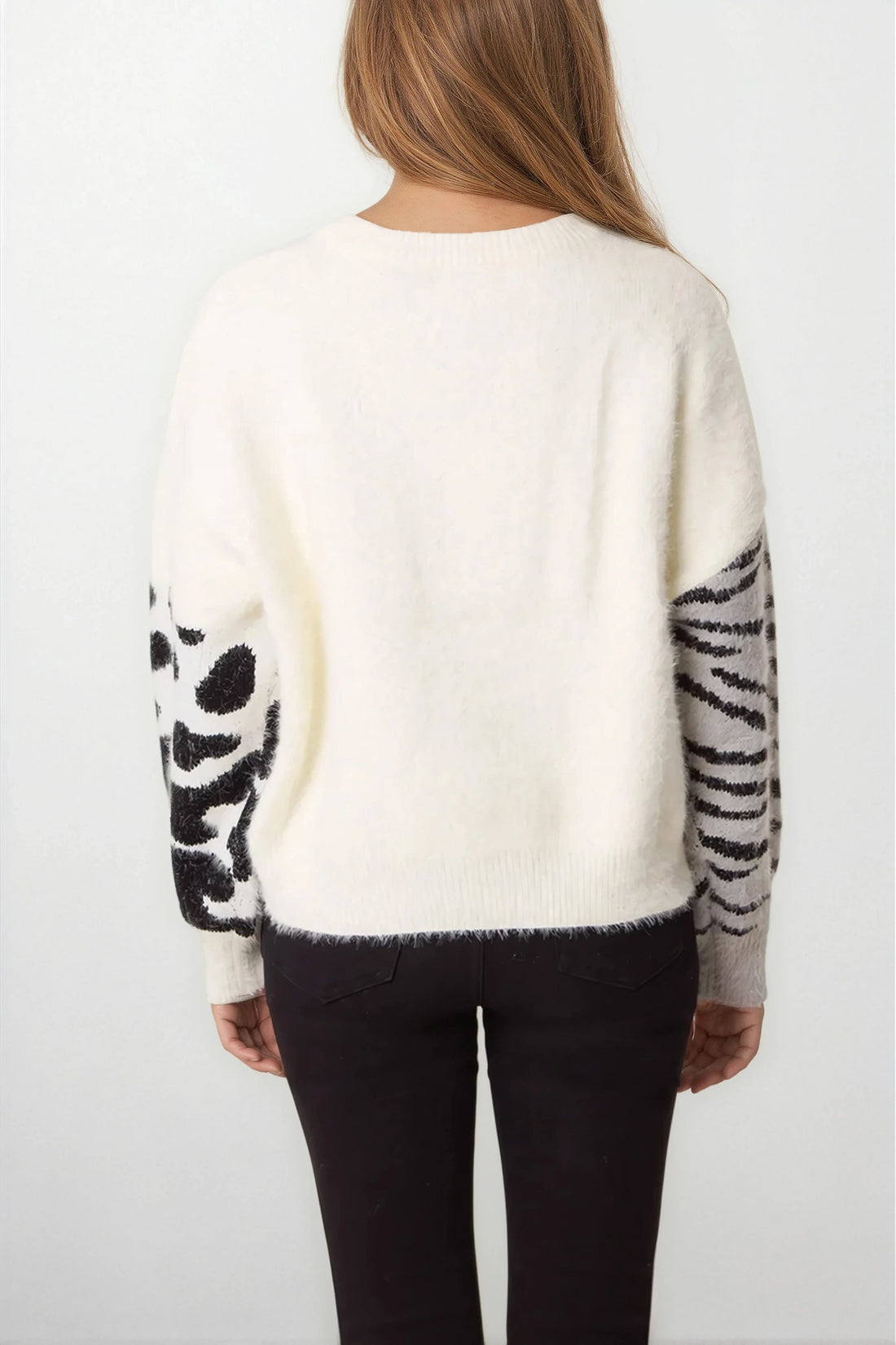 Ivory knit jumper, back view with spotted sleeve panels and ribbed neckline and hem