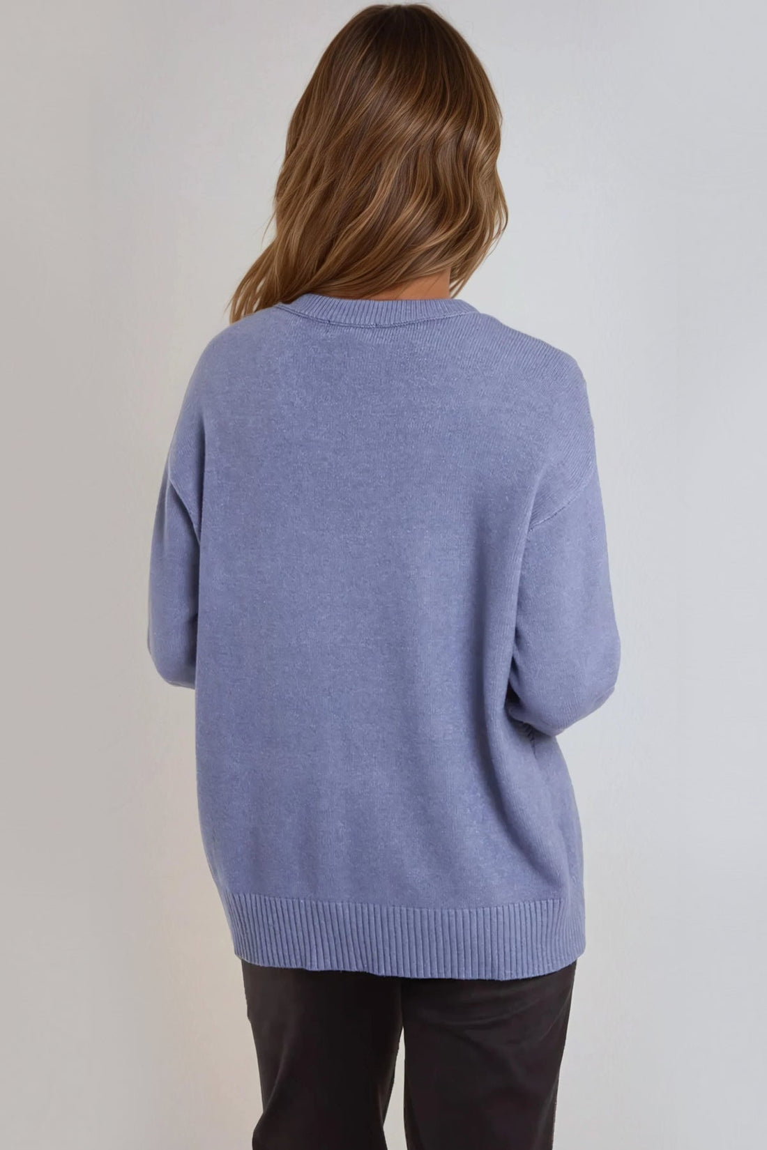 Denim blue knit jumper back view with round crew neck and ribbed hem and cuffs