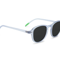 Arly sunglasses, side view: light blue frame with dark lenses and green temple tips
