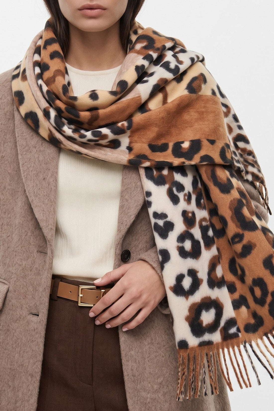 Brown and cream spotted scarf with wide panels and long tassel fringe, draped