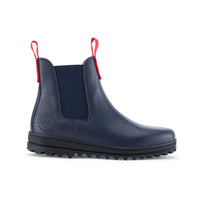 Navy leather Chelsea boot with red pull tabs and a rugged black sole