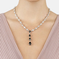 Silver crystal statement necklace with dark teardrop stones at the neckline