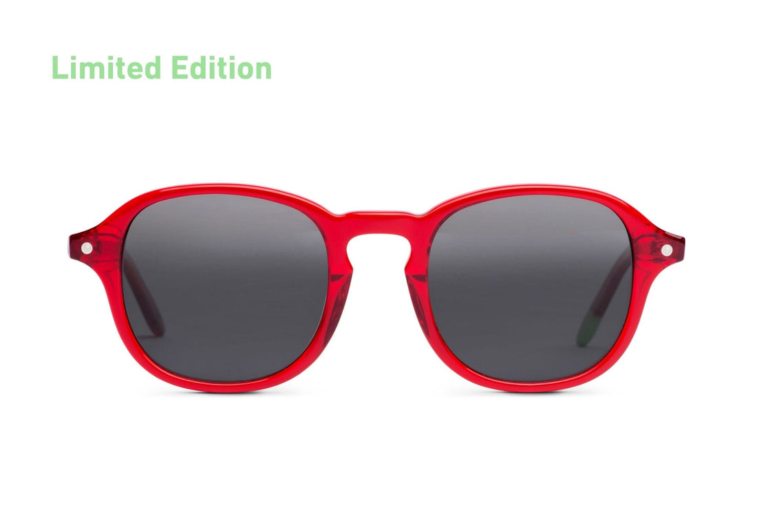 Red round sunglasses with dark tinted lenses, glossy frame and keyhole bridge