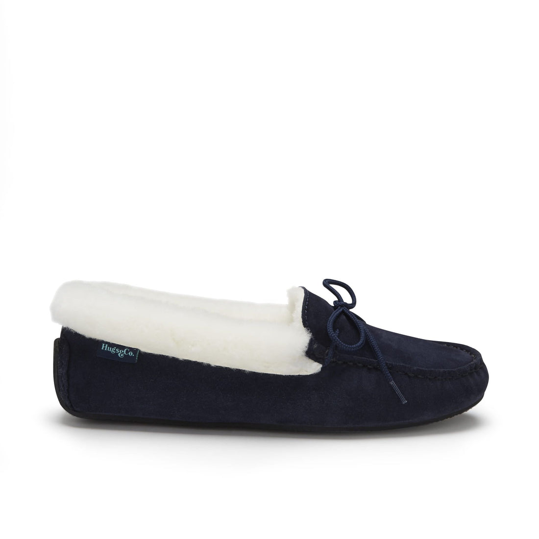 Navy suede sheepskin slipper with a cream lining and tied bow