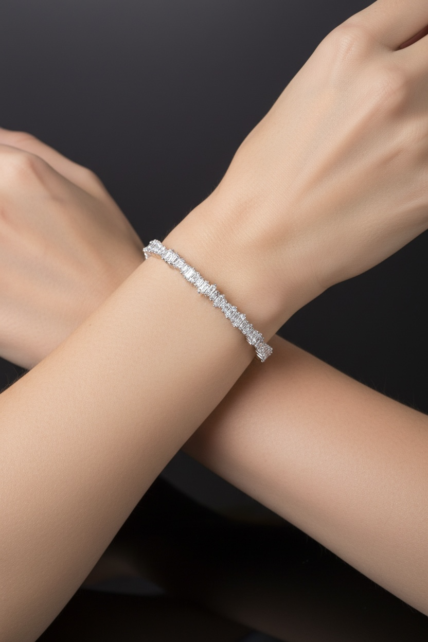 Silver ice cuff bangle with white stones on wrist