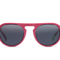 Raspberry pink rounded sunglasses with dark lenses