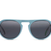 Steel blue round sunglasses with dark lenses and sculpted full frame