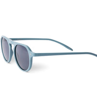 Steel blue sunglasses side profile with dark round lenses and green temple tips