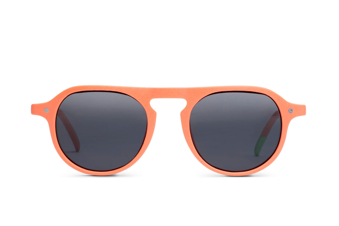 Tangerine rounded cat-eye sunglasses with dark lenses