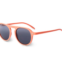 Tangerine cat-eye sunglasses with dark lenses, side view