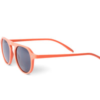 Tangerine cat-eye sunglasses with dark lenses, temple and green tip