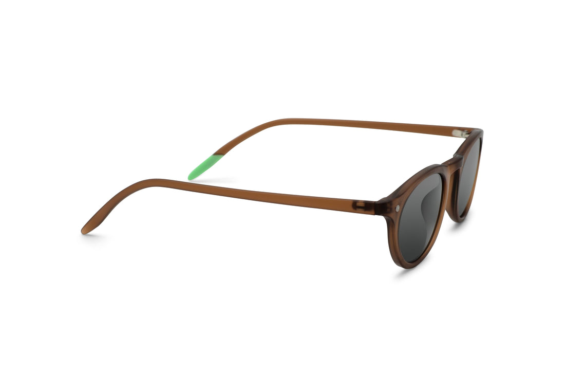 Kilda toffee sunglasses side profile, dark oval lenses on brown frame