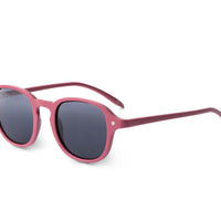 Side view of raspberry sunglasses with dark lenses and curved arms