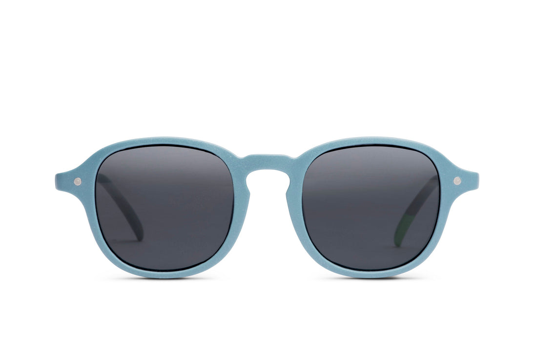 Steel blue round sunglasses with dark lenses and slim arms