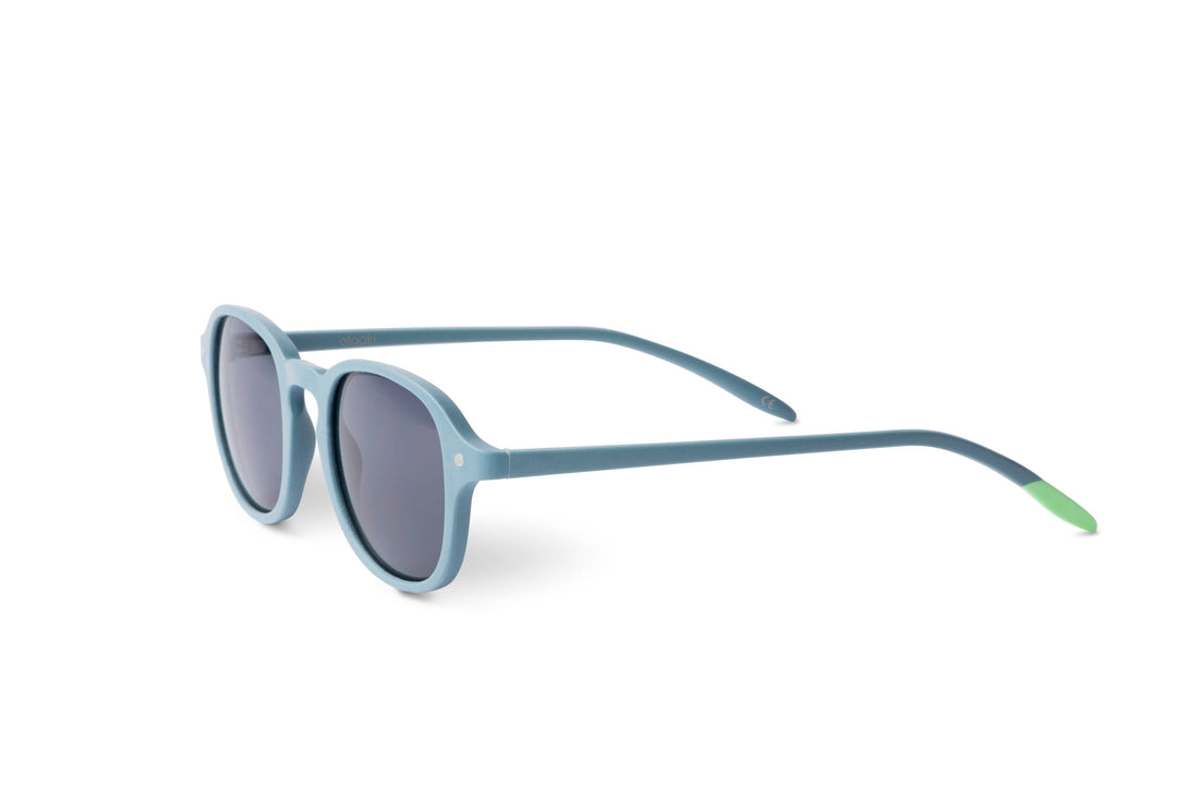 Steel blue sunglasses angled view with dark lenses and slim arms