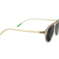 Champagne frame sunglasses with dark lenses, side view of temple