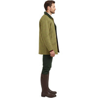 Men's tweed jacket in olive check, shown from the side with a dark green collar