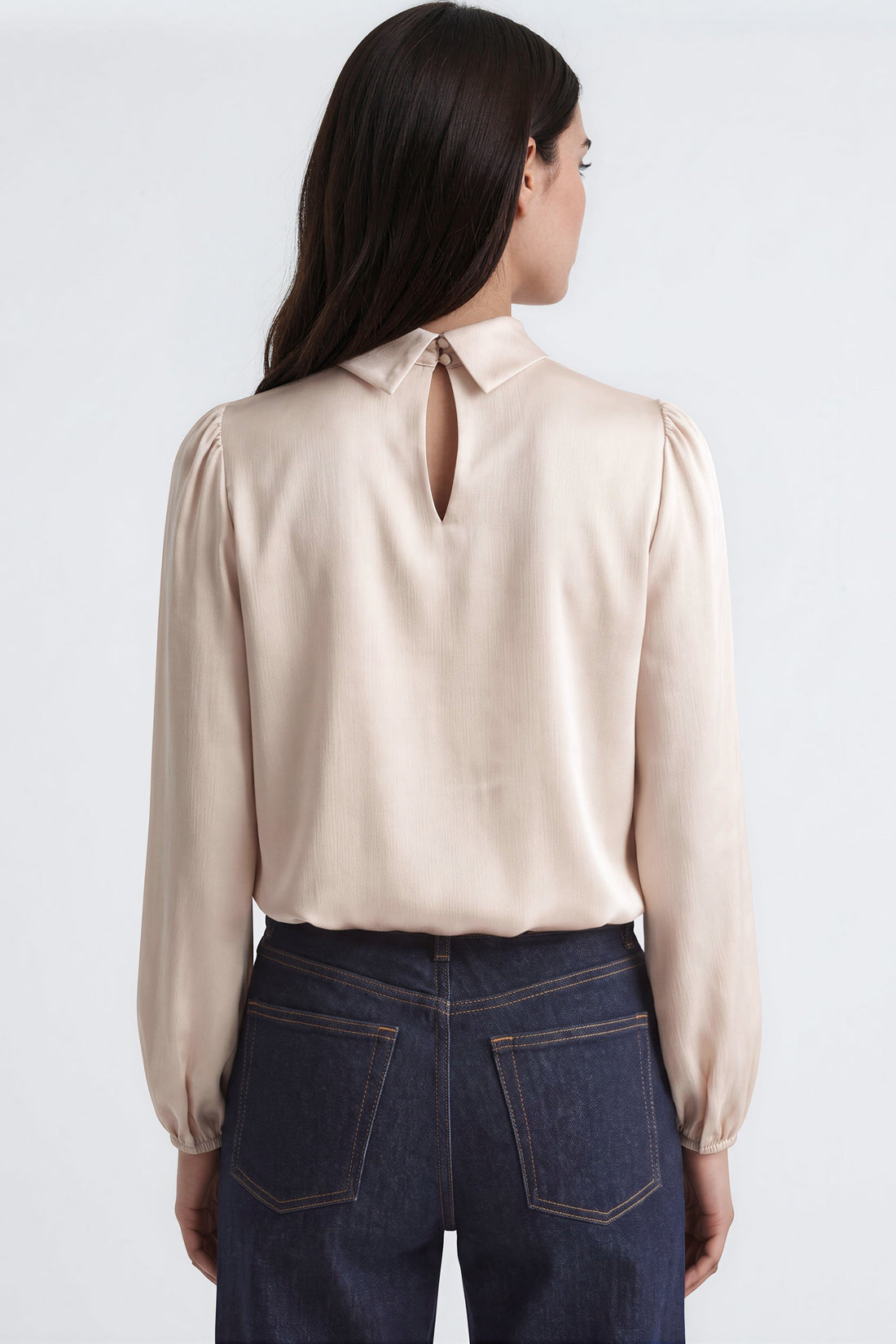 Champagne satin-look blouse back with keyhole neck opening and gathered shoulders