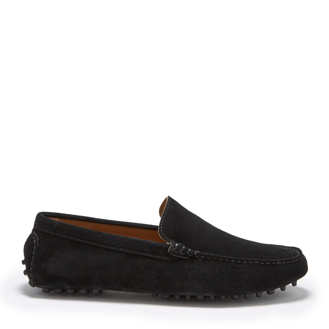 Black suede driving loafer in side view with stitched apron and rubber pebble sole.