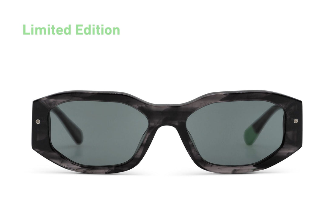 Tayrona smokey black sunglasses with dark tortoiseshell frame and green tinted lenses