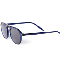 Indigo blue sunglasses, angled side view, dark lenses and green temple ends