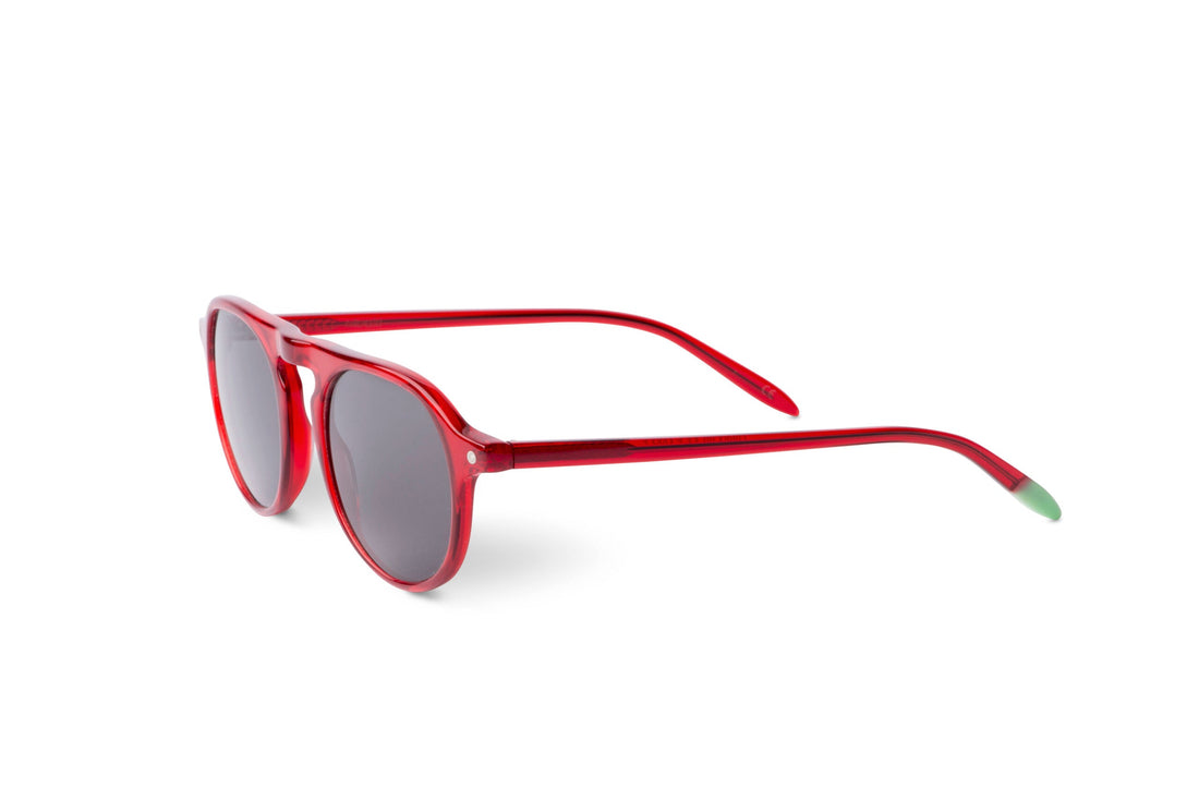 Poppy red Zingaro sunglasses, angled side view, dark lenses on full frame