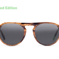 Tortoiseshell brown round sunglasses with dark gray lenses and slim bridge