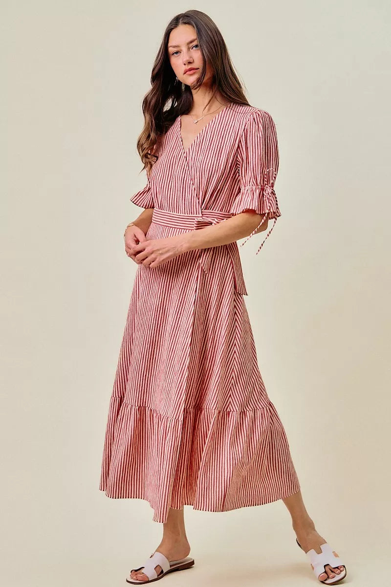 Red striped wrap midi dress with puff sleeves, V-neck, and tied waist
