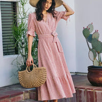 Red and white striped wrap midi dress with puff sleeves, belted waist and tiered skirt