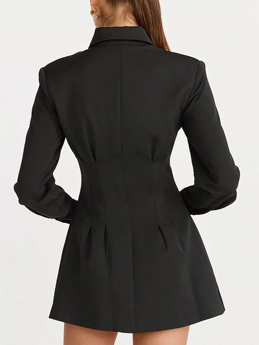 Black blazer mini dress back view with structured seam lines and flared skirt.