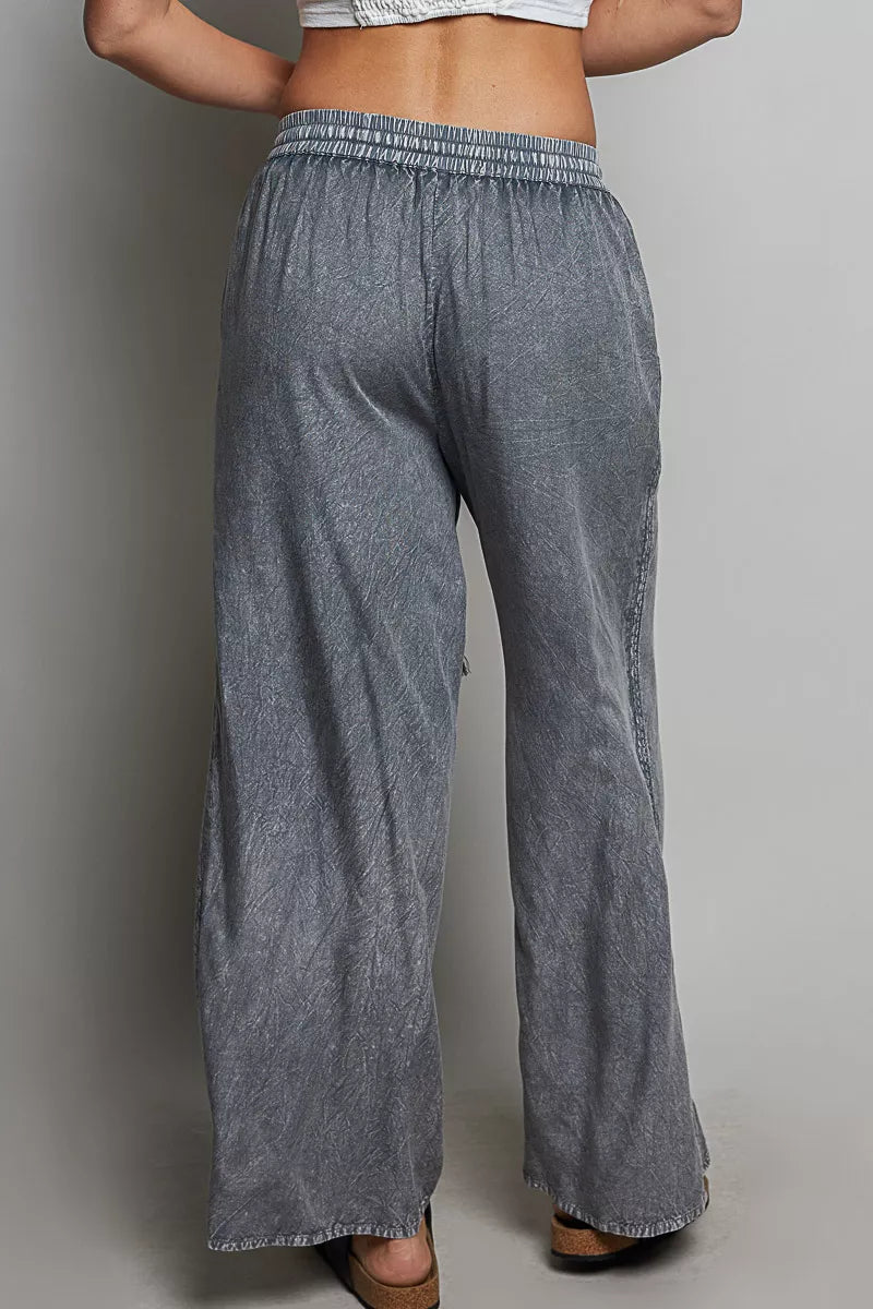 Charcoal wide-leg woven pants, elastic waistband, relaxed straight legs