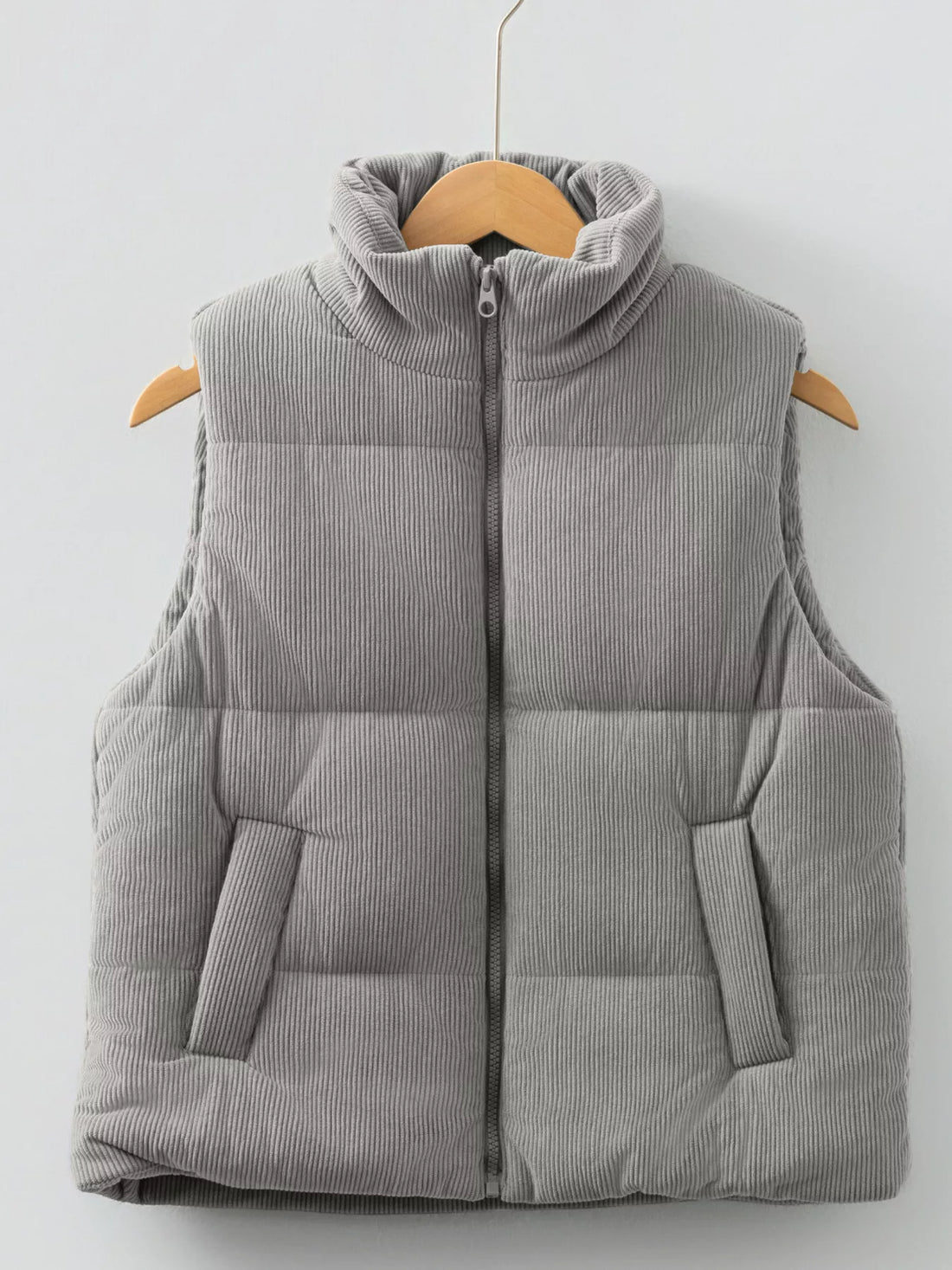 Gray corduroy puffer vest, stand collar, full front zipper; quilted padded front and back.