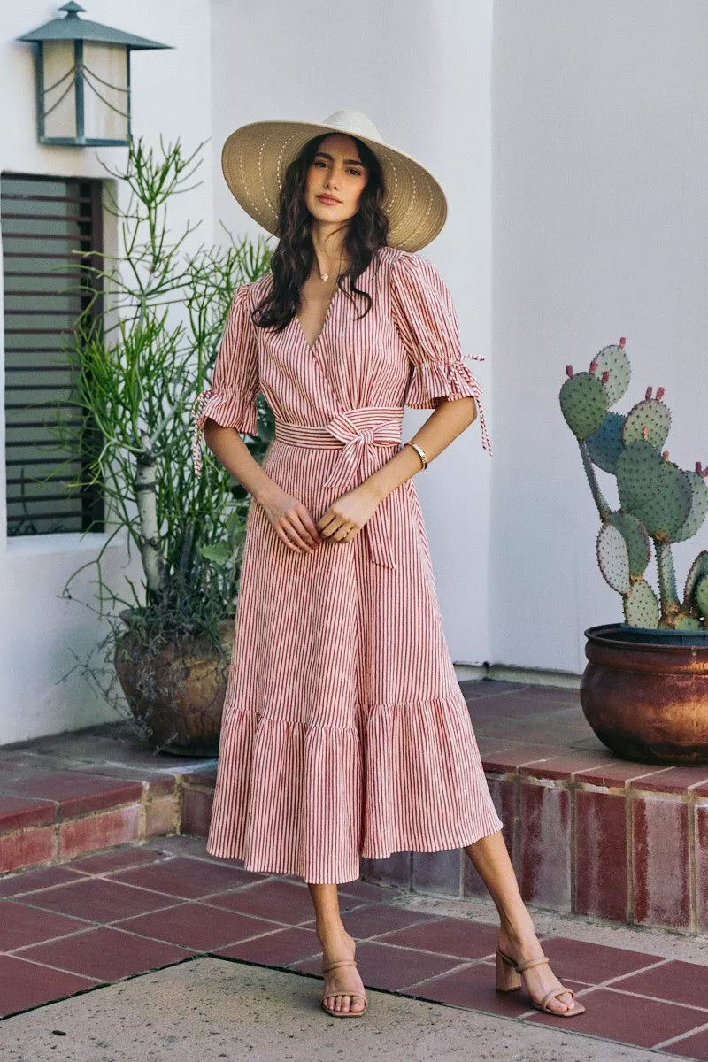 Red-and-white striped wrap midi dress, V-neck and tied waist, short puff sleeves