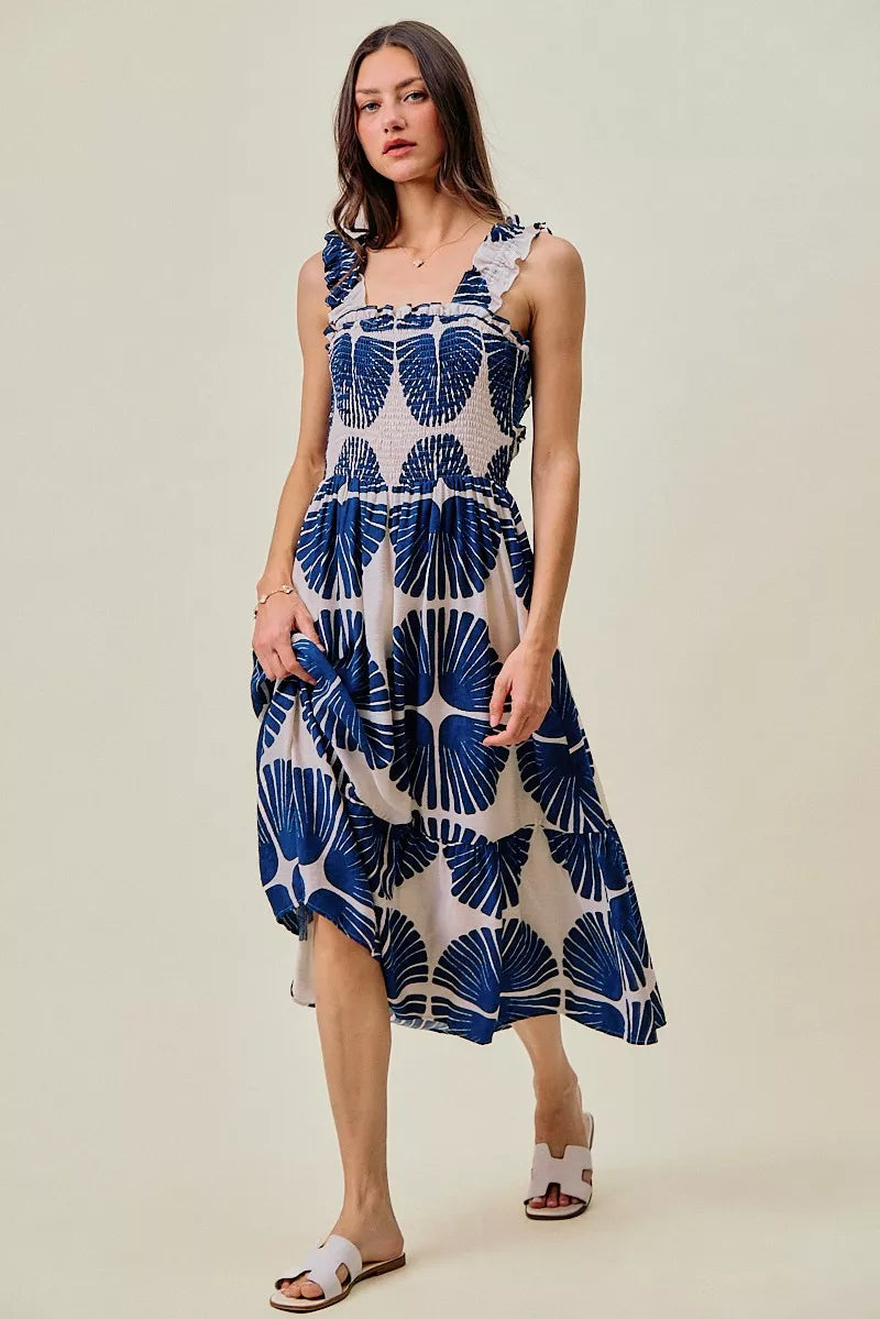 Navy abstract print tiered midi dress with smocked bodice and scalloped ruffle straps